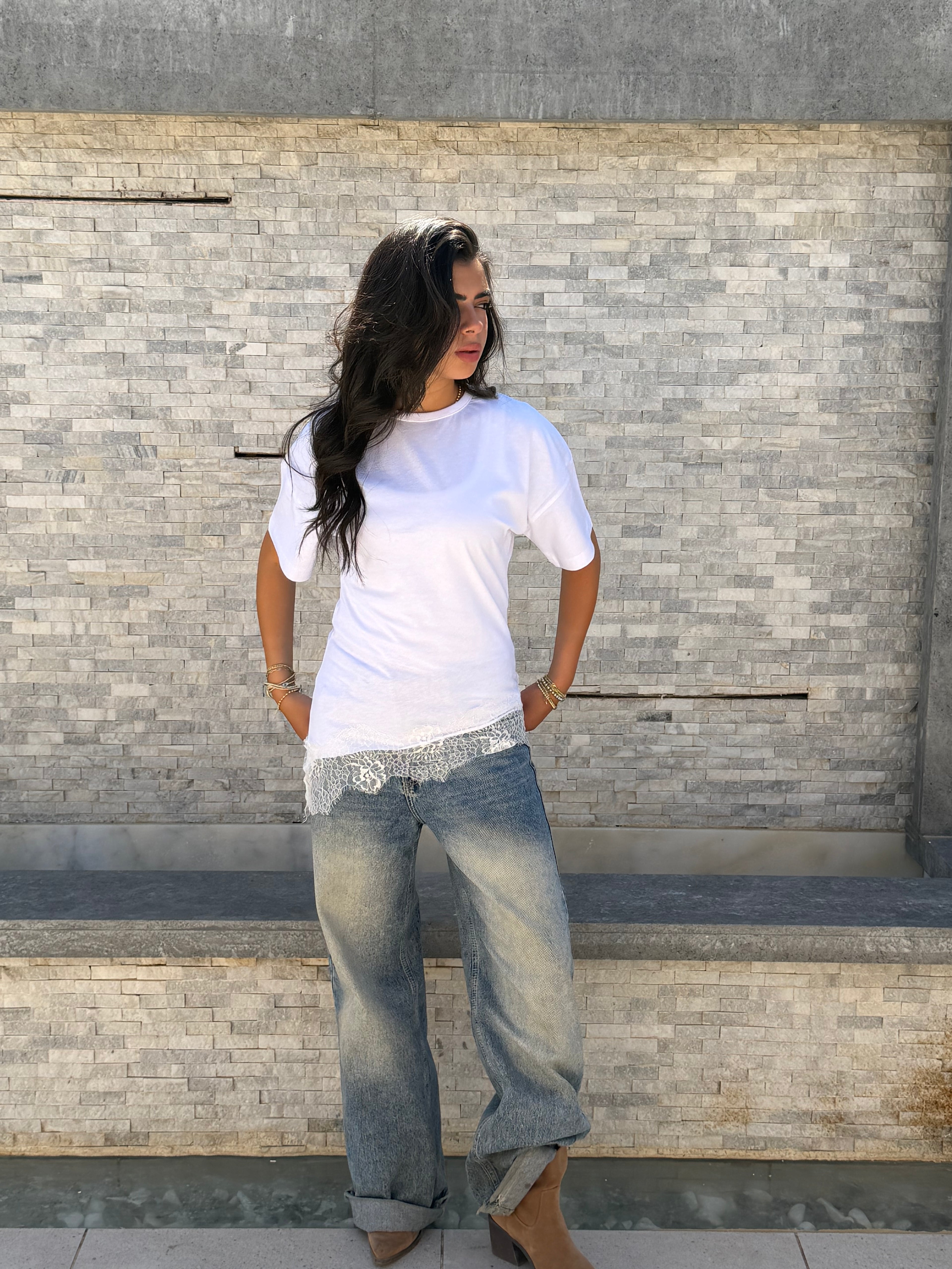 Waist-fitted lace tee.