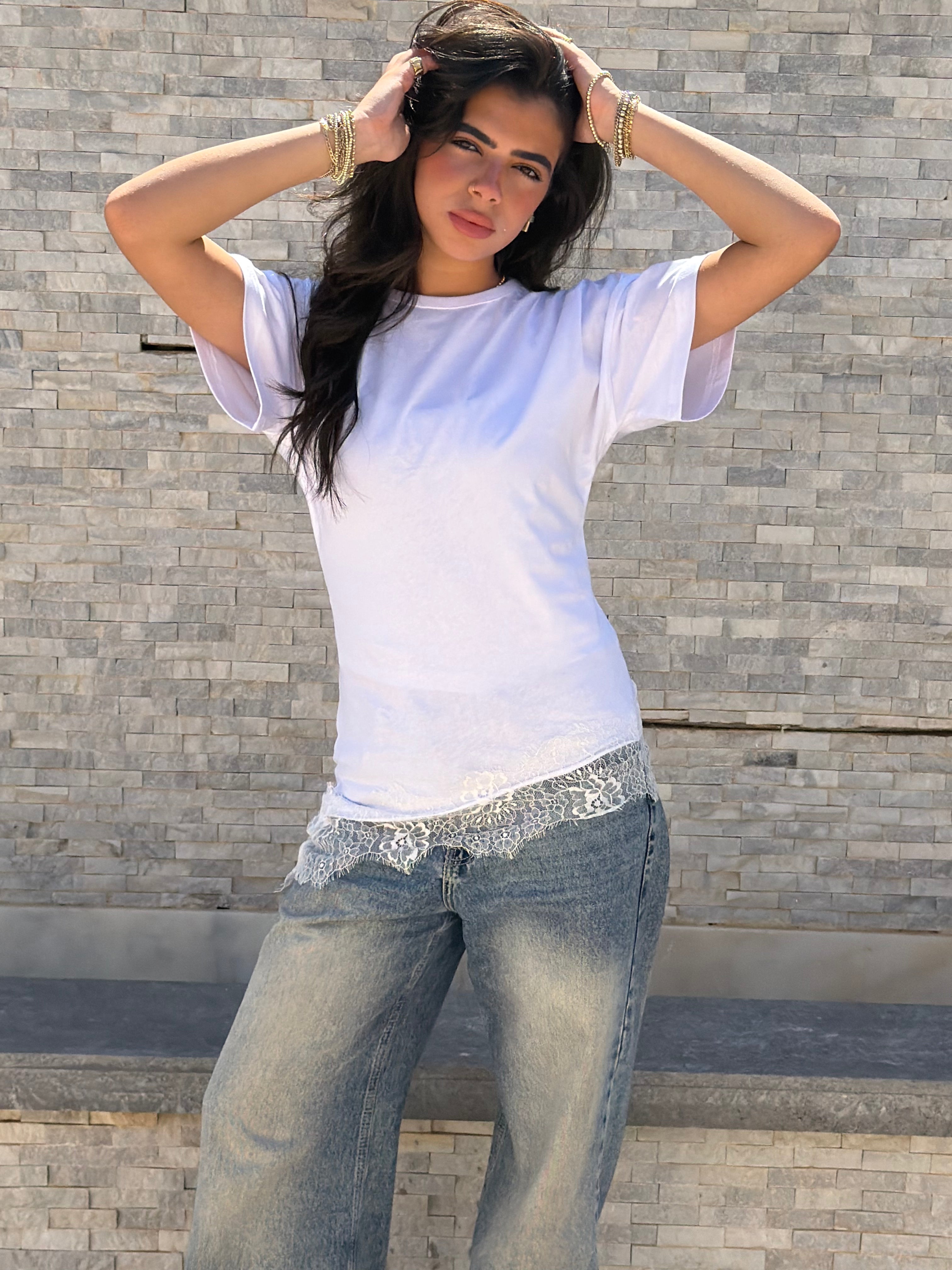 Waist-fitted lace tee.