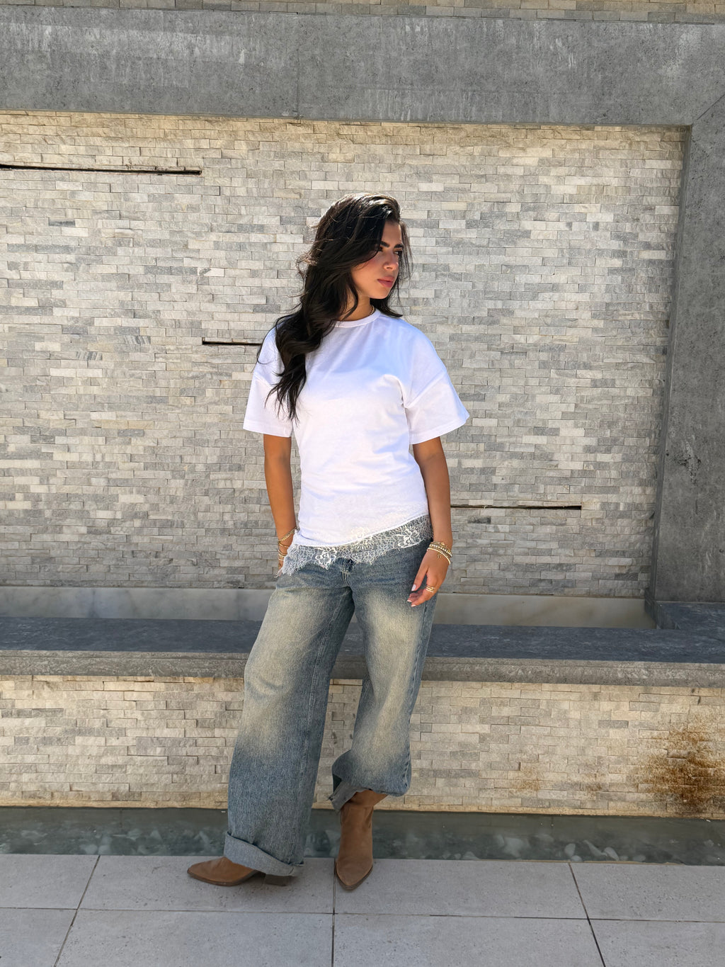 Waist-fitted lace tee.