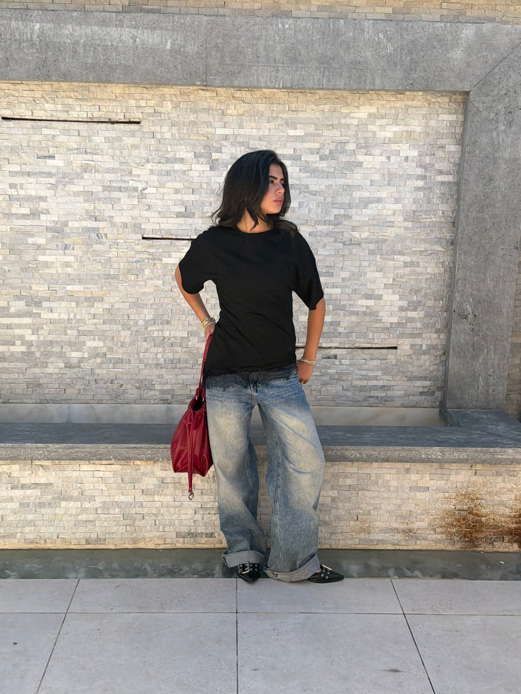 Waist-fitted lace tee.