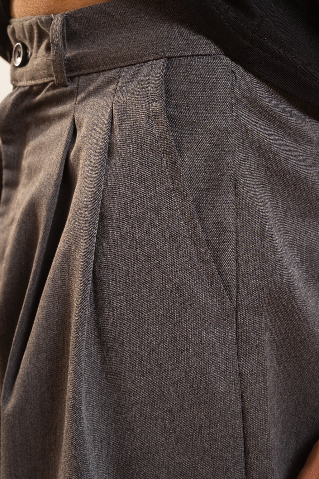 pleated trouser.