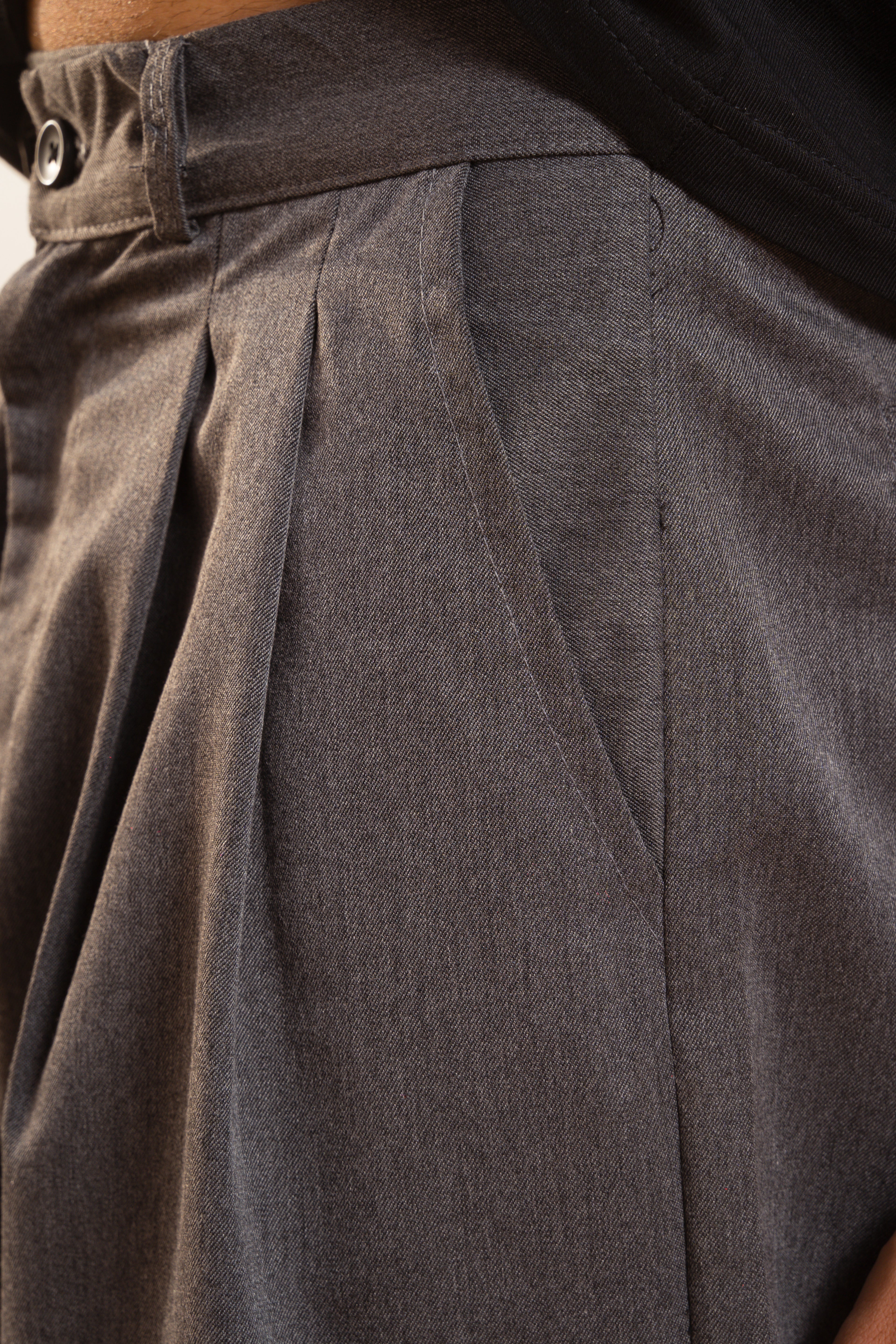 pleated trouser.