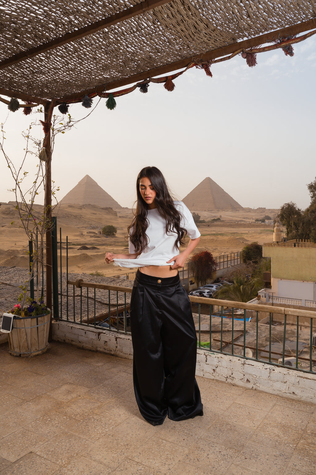 Flowing satin trousers.