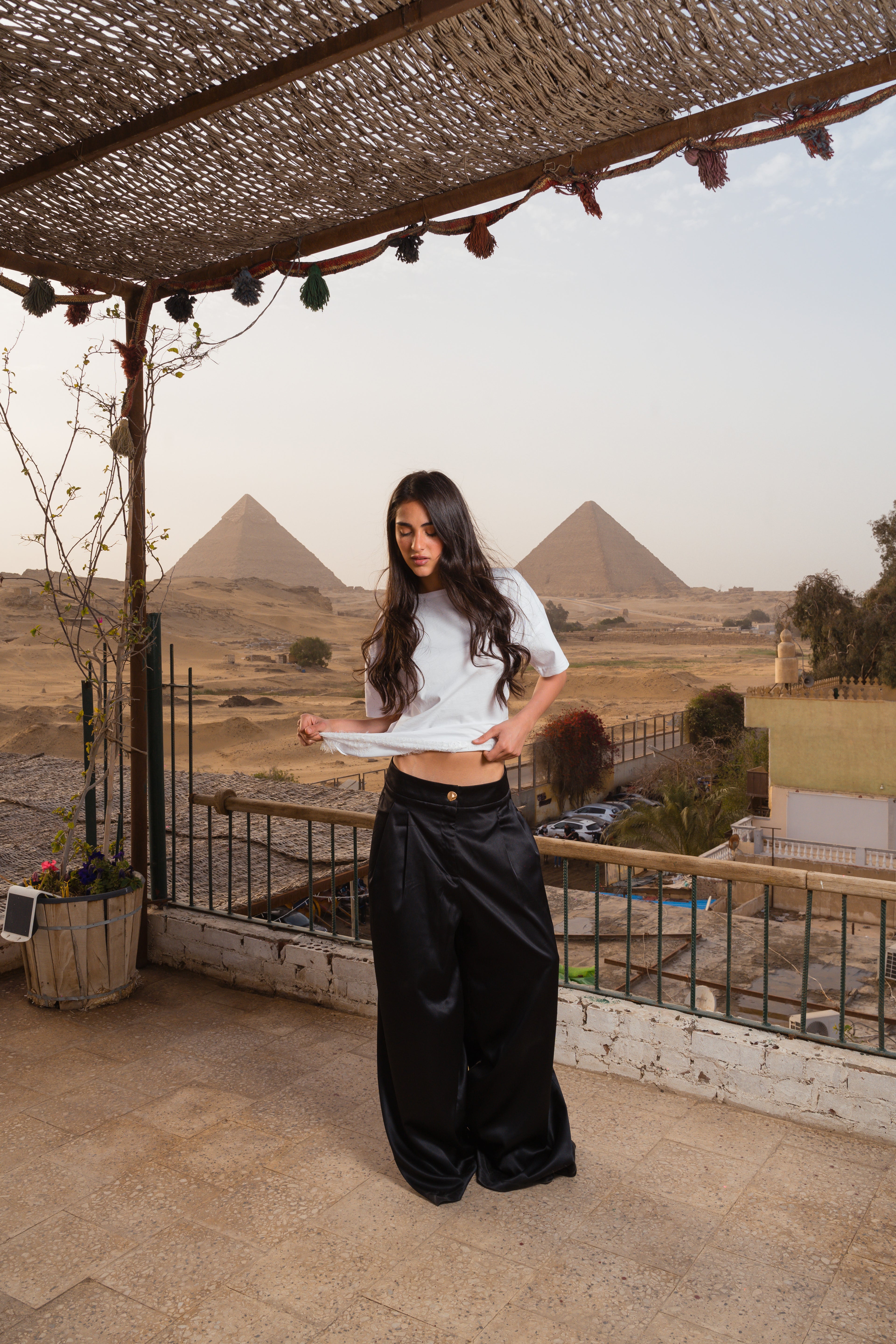 Flowing satin trousers.